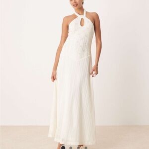Drop hem embellished dress